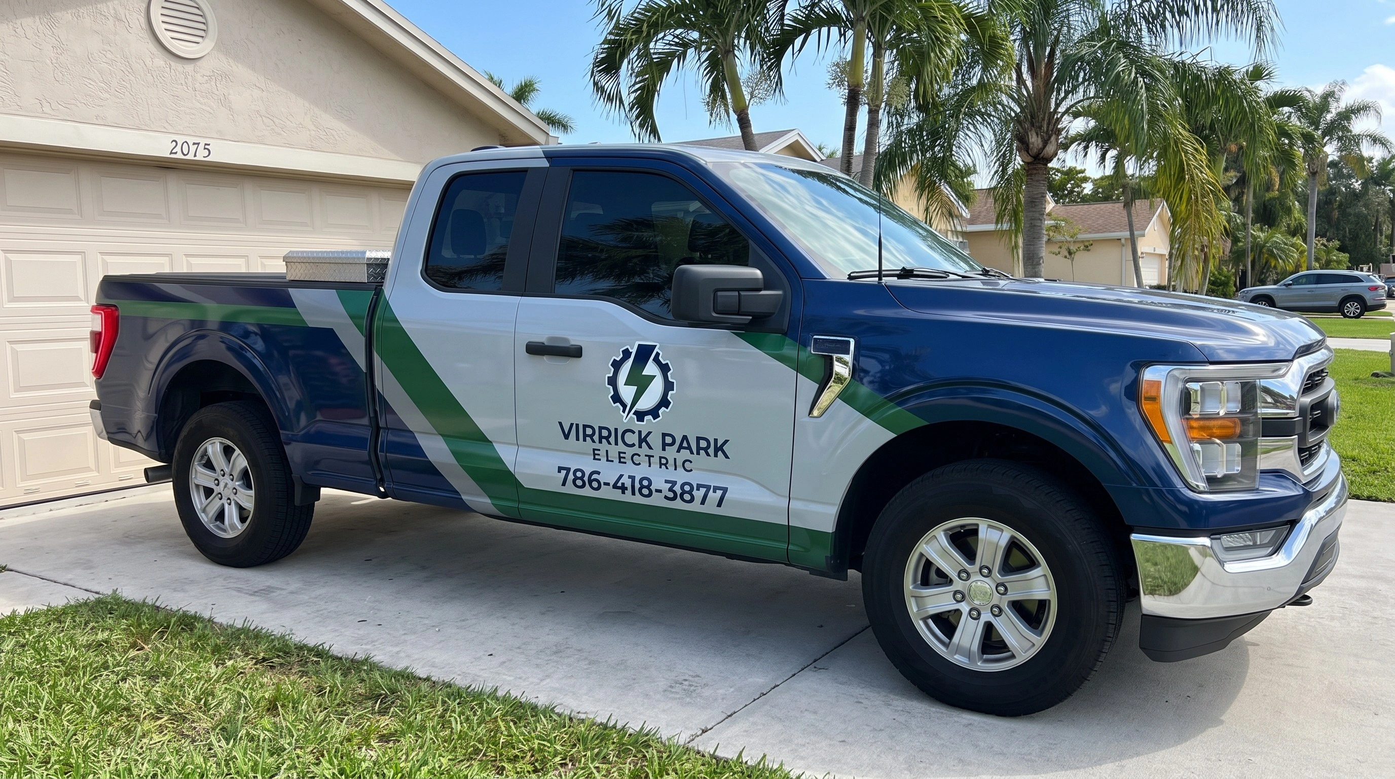 Licensed electricians performing electrical work in Miami, FL